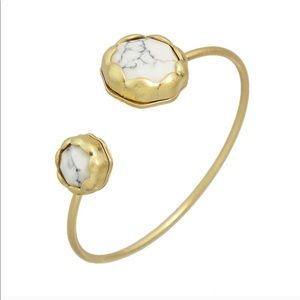 Stackable gold bracelet with white stone